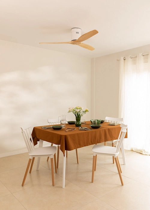 CREATE WINDCALM ceiling fan in White / Light Wood installed in a bright modern dining room