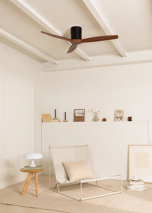 CREATE black ceiling fan with dark wood blades mounted on a white ceiling