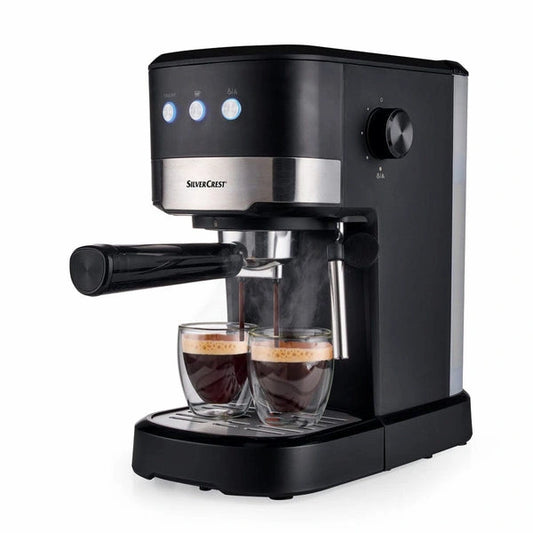 Black SilverCrest espresso machine with two glasses of coffee on a white background