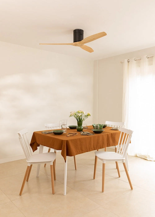 Create ceiling fan in a dining room with a table and  set for four white chairs